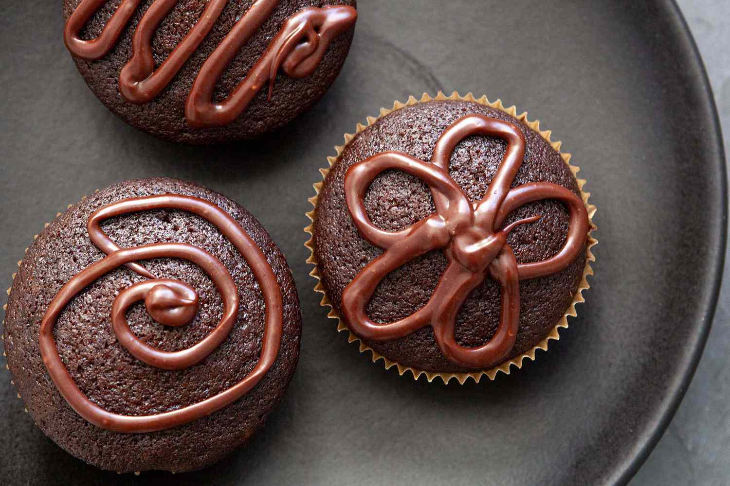 A platter of moist chocolate cupcakes.