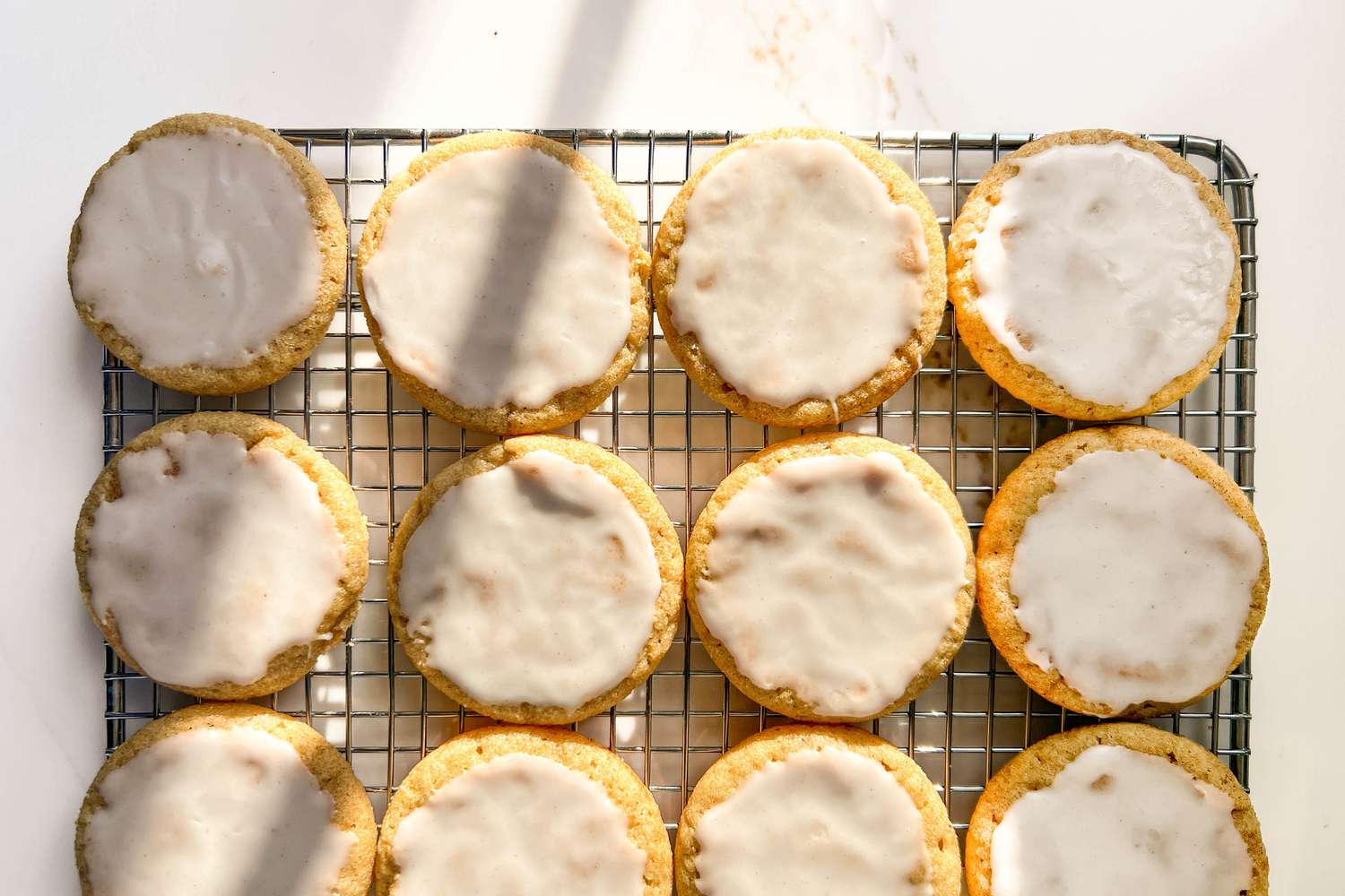 Taylor Swift Cookies on a wire rack