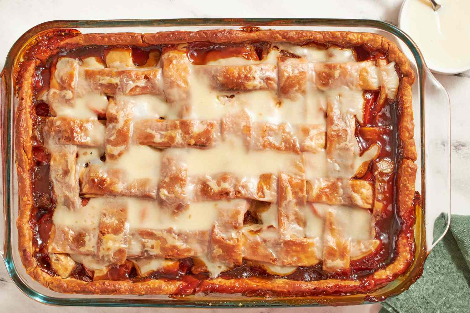 Sweet potato dessert with lattice crust and glaze in a baking dish
