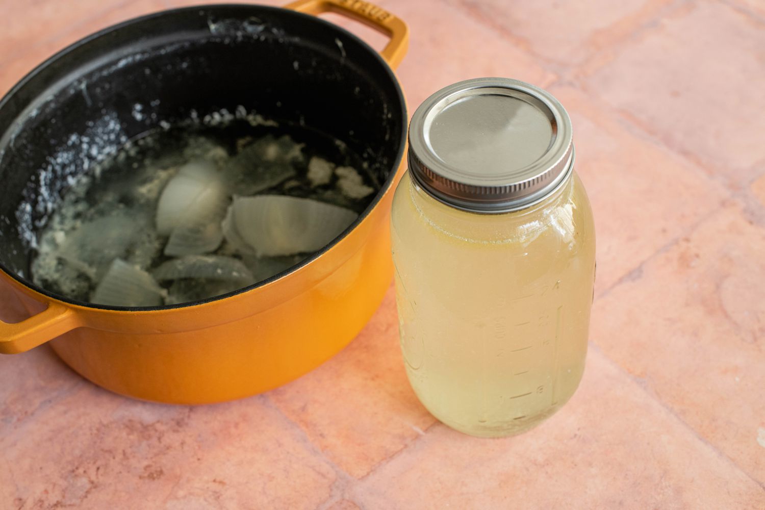 Chicken Stock in a Mason Jar and the Leftovers in the Dutch Oven 