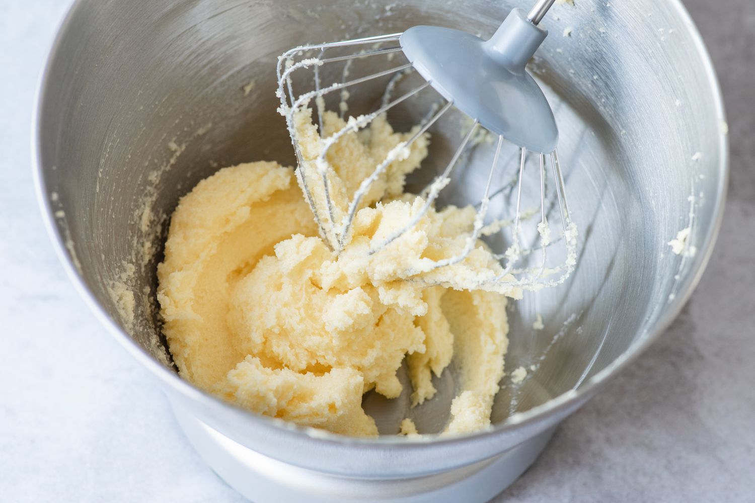 Butter and Sugar in a Mixer for Coconut Cupcakes Recipe