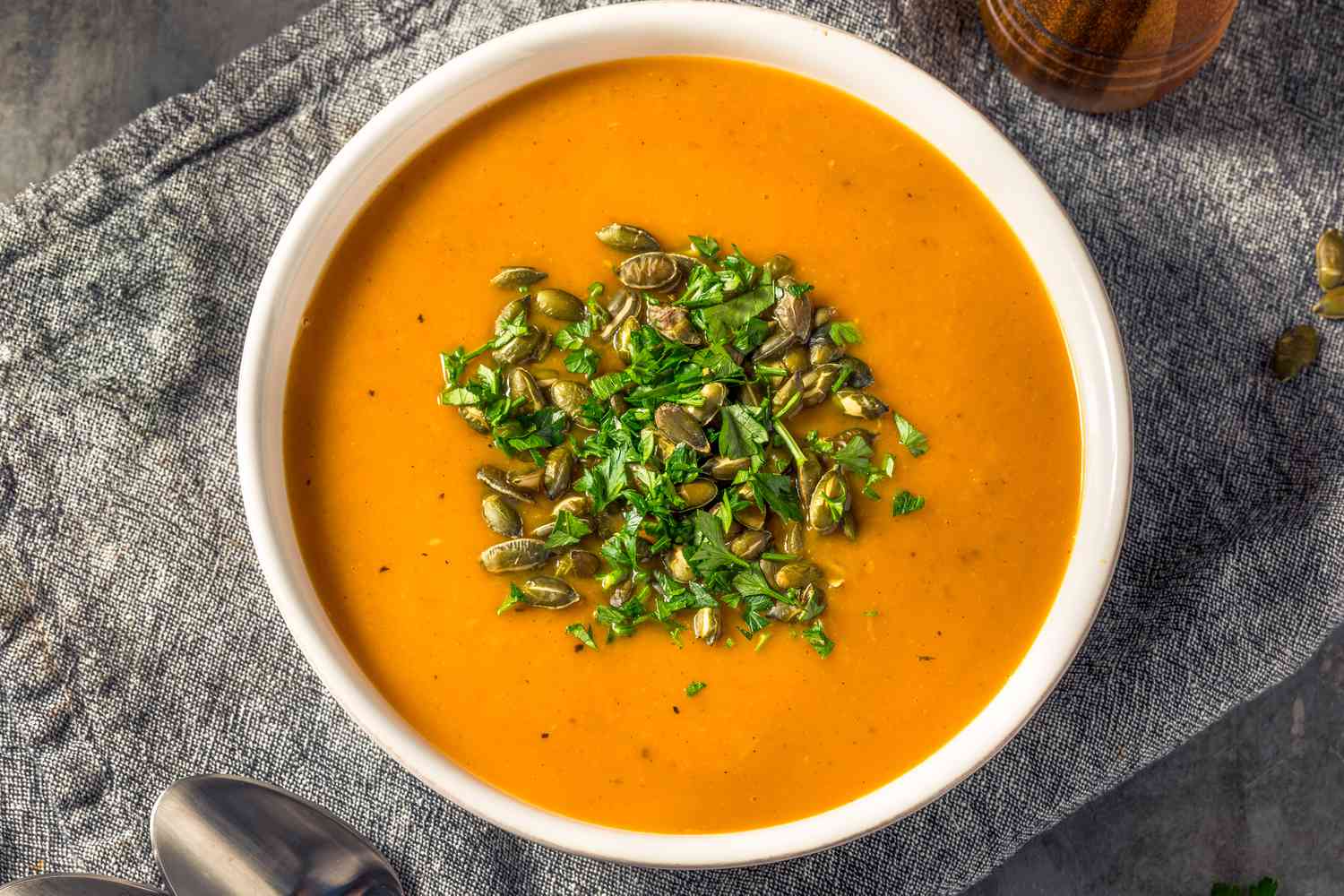 butternut squash soup in a white bowl