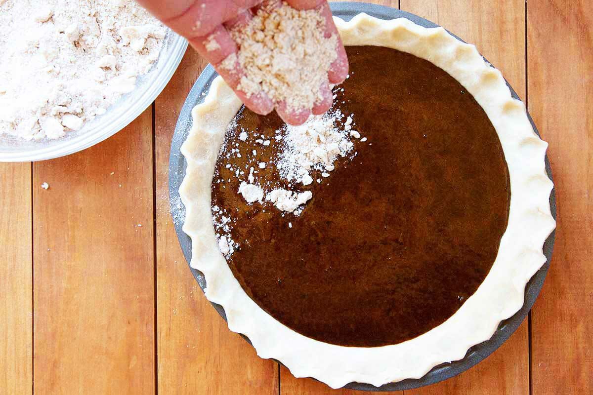 How to make shoofly pie by topping the filling with crumb topping.