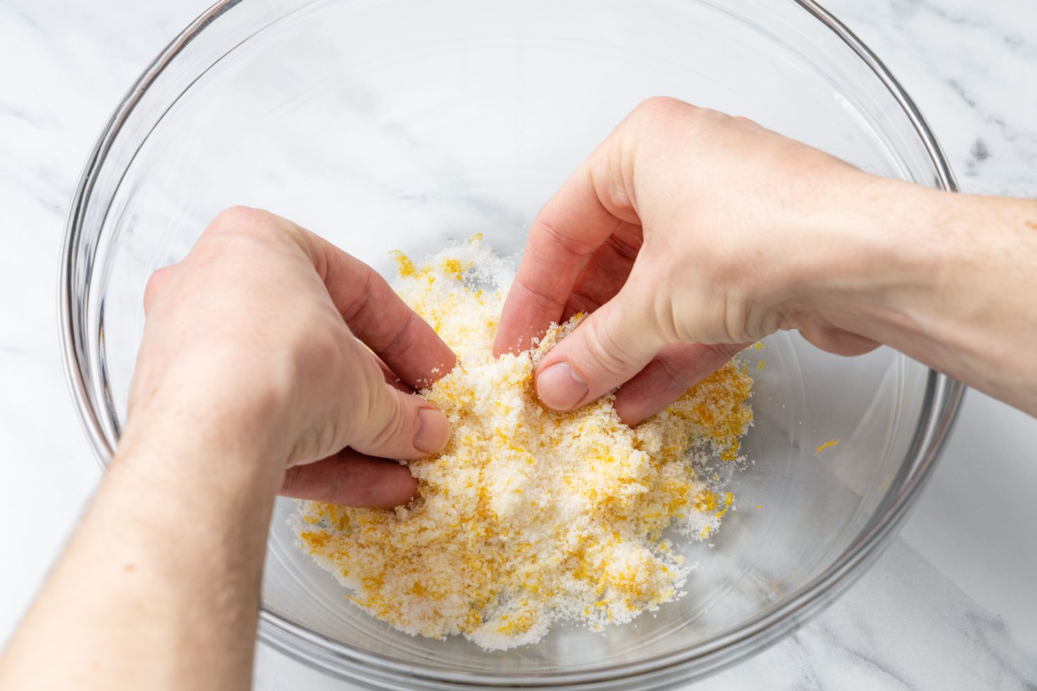 Lemon Zest Rubbed into Sugar in a Bowl for Scones