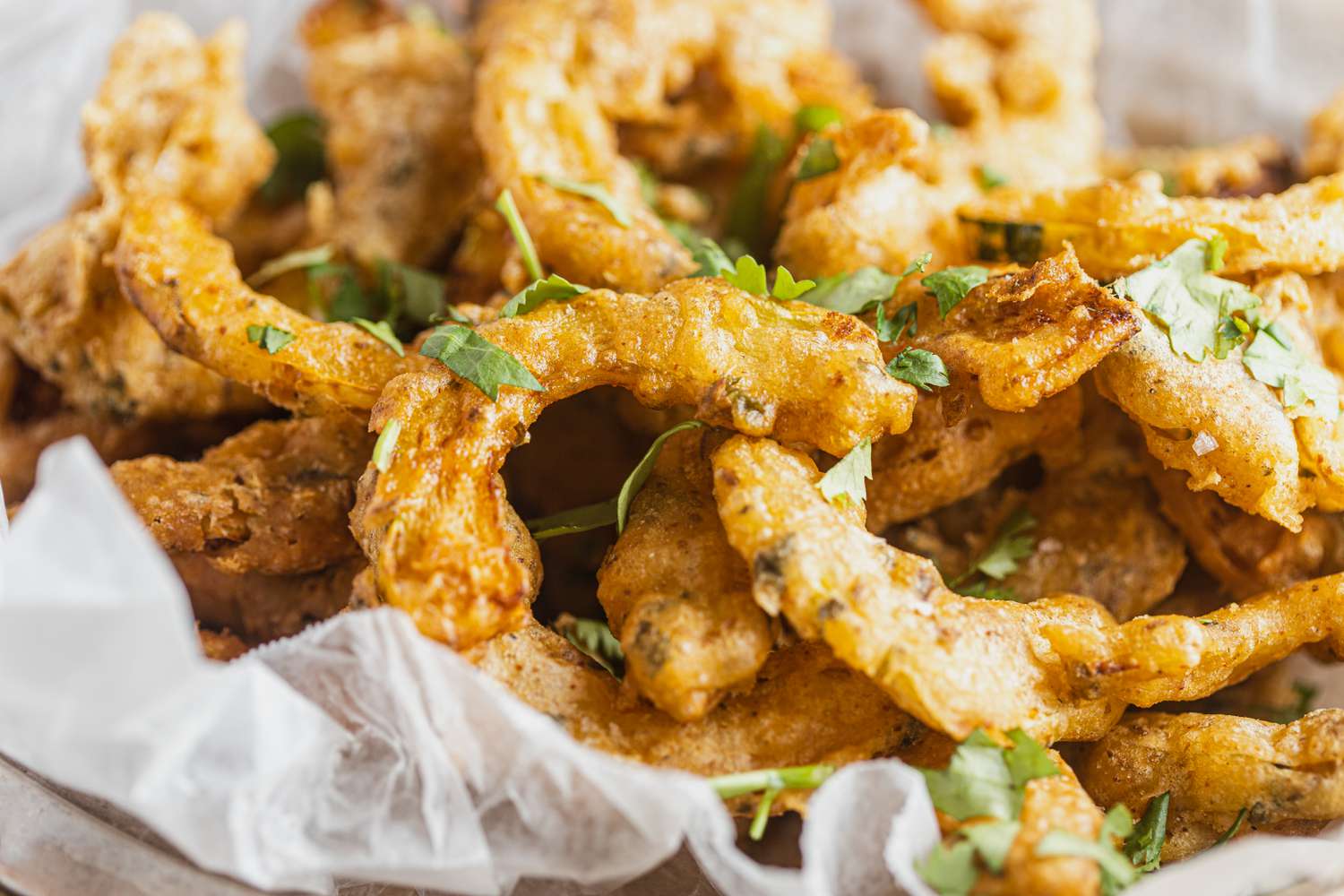 Platter of Delicata Squash Pakoras Topped with Chopped Cilantro 