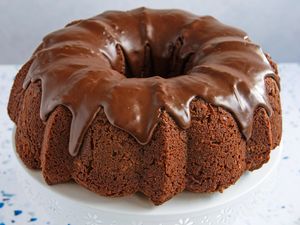 A chocolate bundt cake with glaze on top