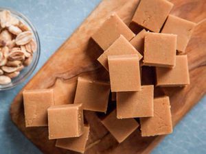 Peanut Butter Fudge squares on cutting board