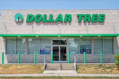 Exterior view of a Dollar Tree store with visible signage and storefront entrance