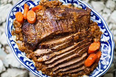 Beef Brisket recipe with carrots on platter