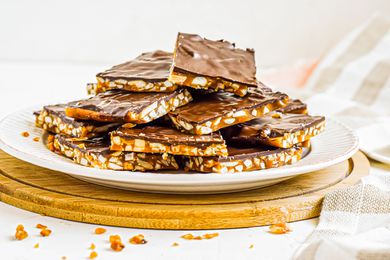 Side view of roca candy piled on a plate.