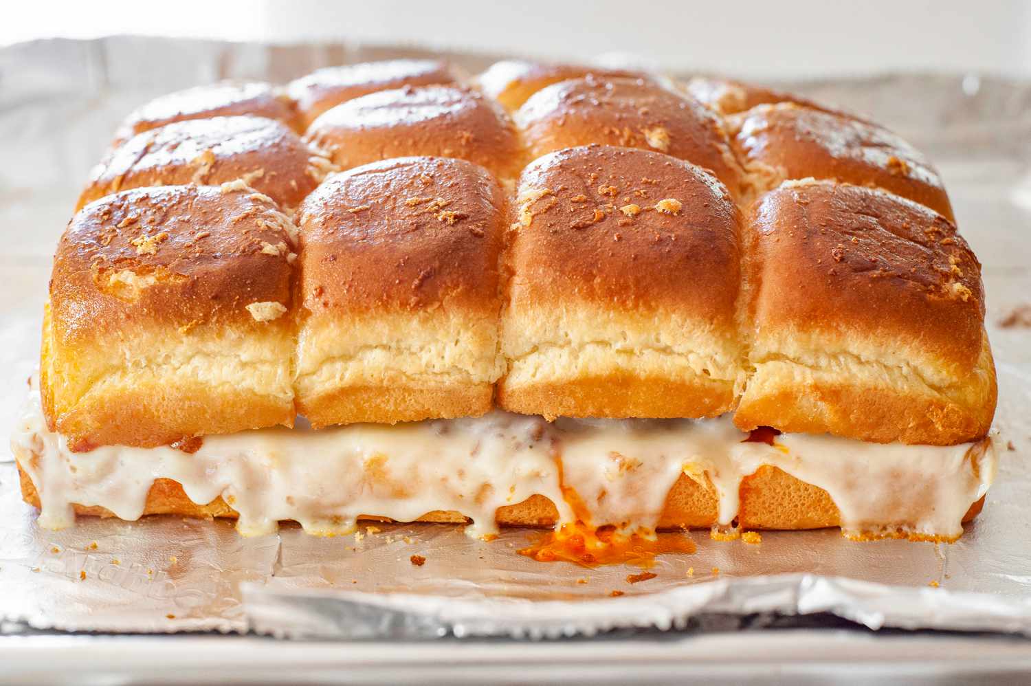 Hawaiian Roll Sliders with Meat Sauce and Parm
