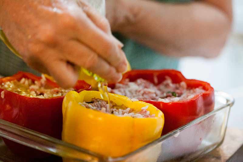 stuffed bell peppers in baking dish
