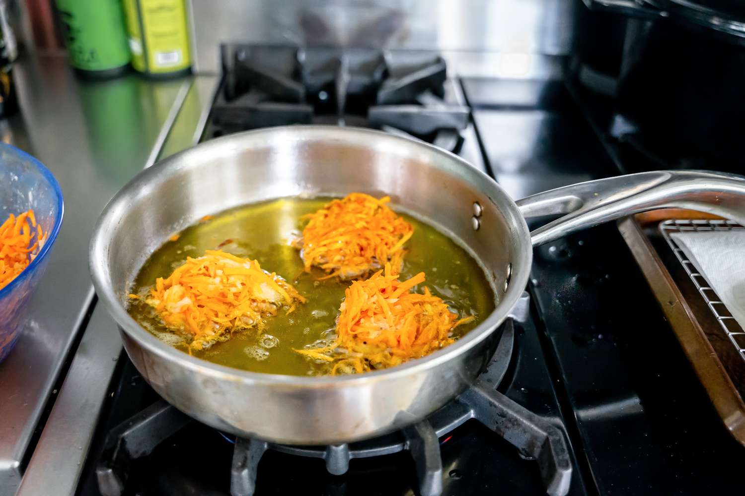 Sweet Potato Latkes Fried in a Pot of Oil