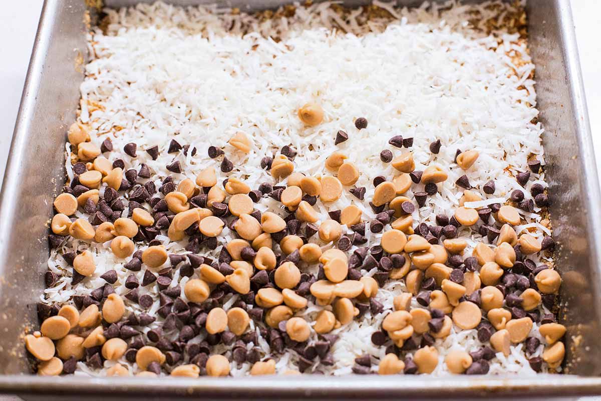 Magic Cookie Bars with Peanut Butter and Pretzels add the chips