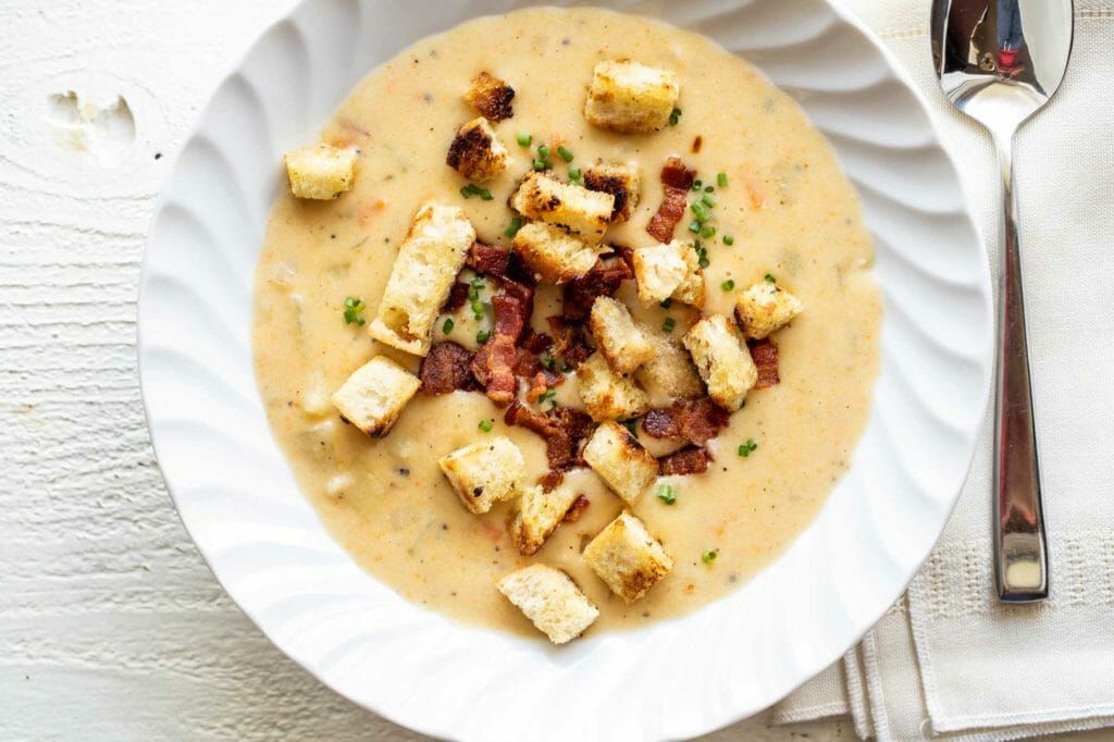 Blended potato soup creamy with croutons