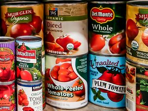Various canned tomato products from different brands shown together