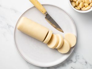 Log of Marzipan with Sliced Marzipan Disks Next to It