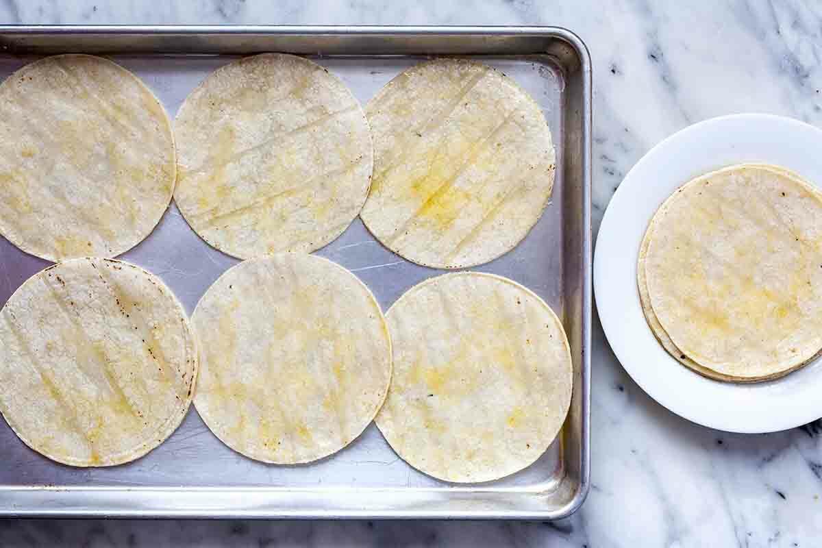 How to Make Stacked Enchiladas brush the tortillas with oil