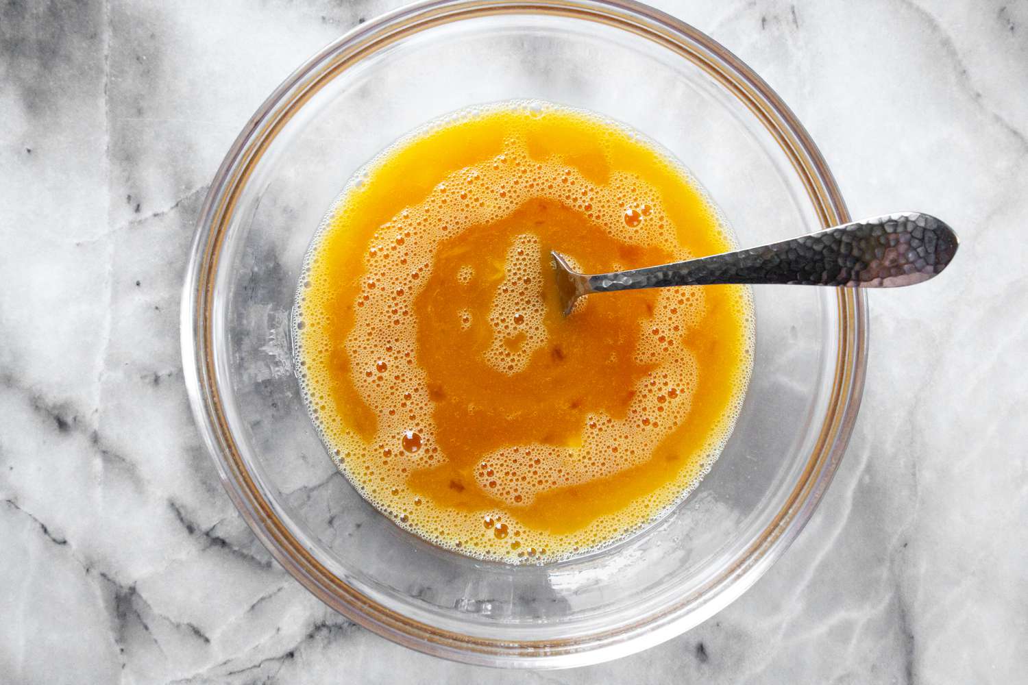 Mixed Eggs in Bowl with a Fork for Tamagoyaki