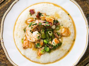 Shrimp and grits on a white plate