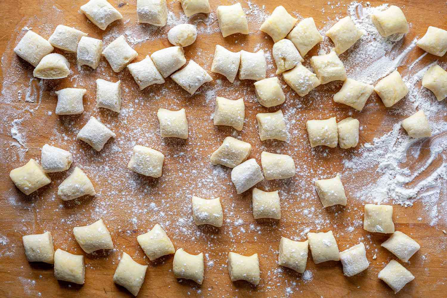 Potato Gnocchi begin cut by hand on a floured board