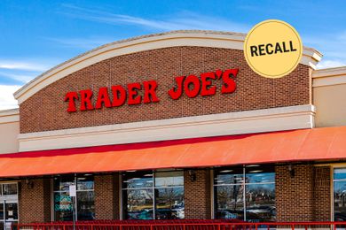Trader Joes storefront with a recall graphic over top