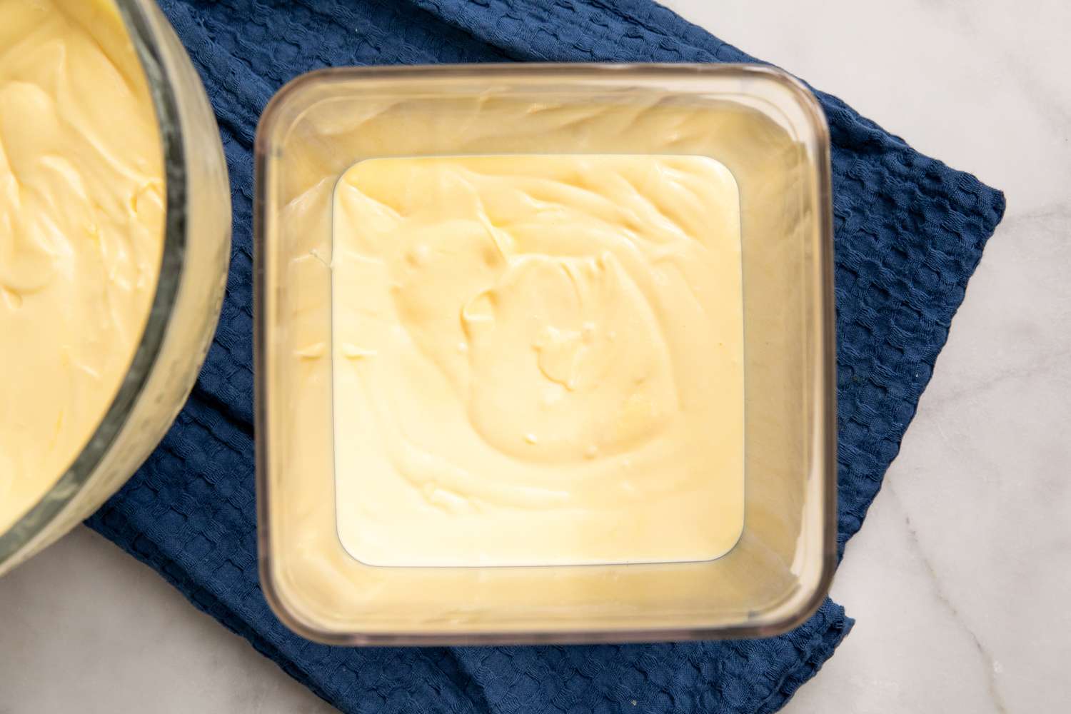 overhead view of first pudding layer in square dish for Southern Banana Pudding