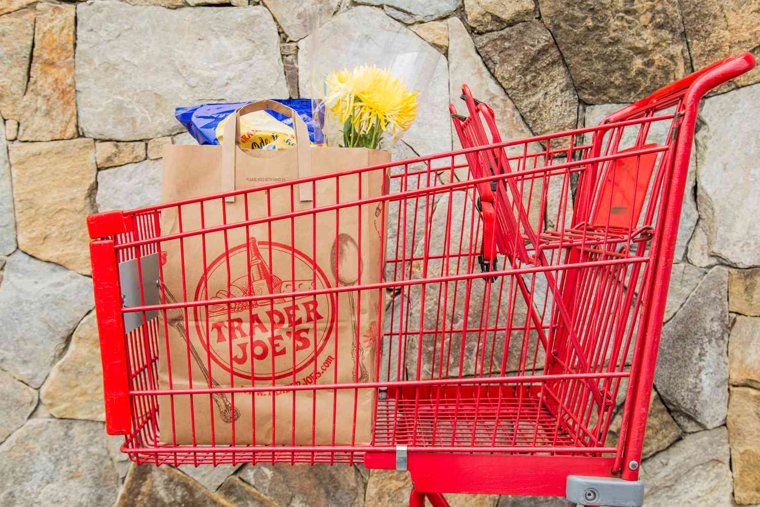 trader joe's bag in a cart 