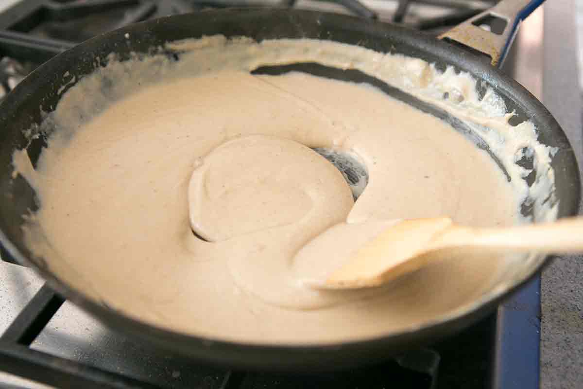 A creamy chicken fried steak gravy from drippings in a pan