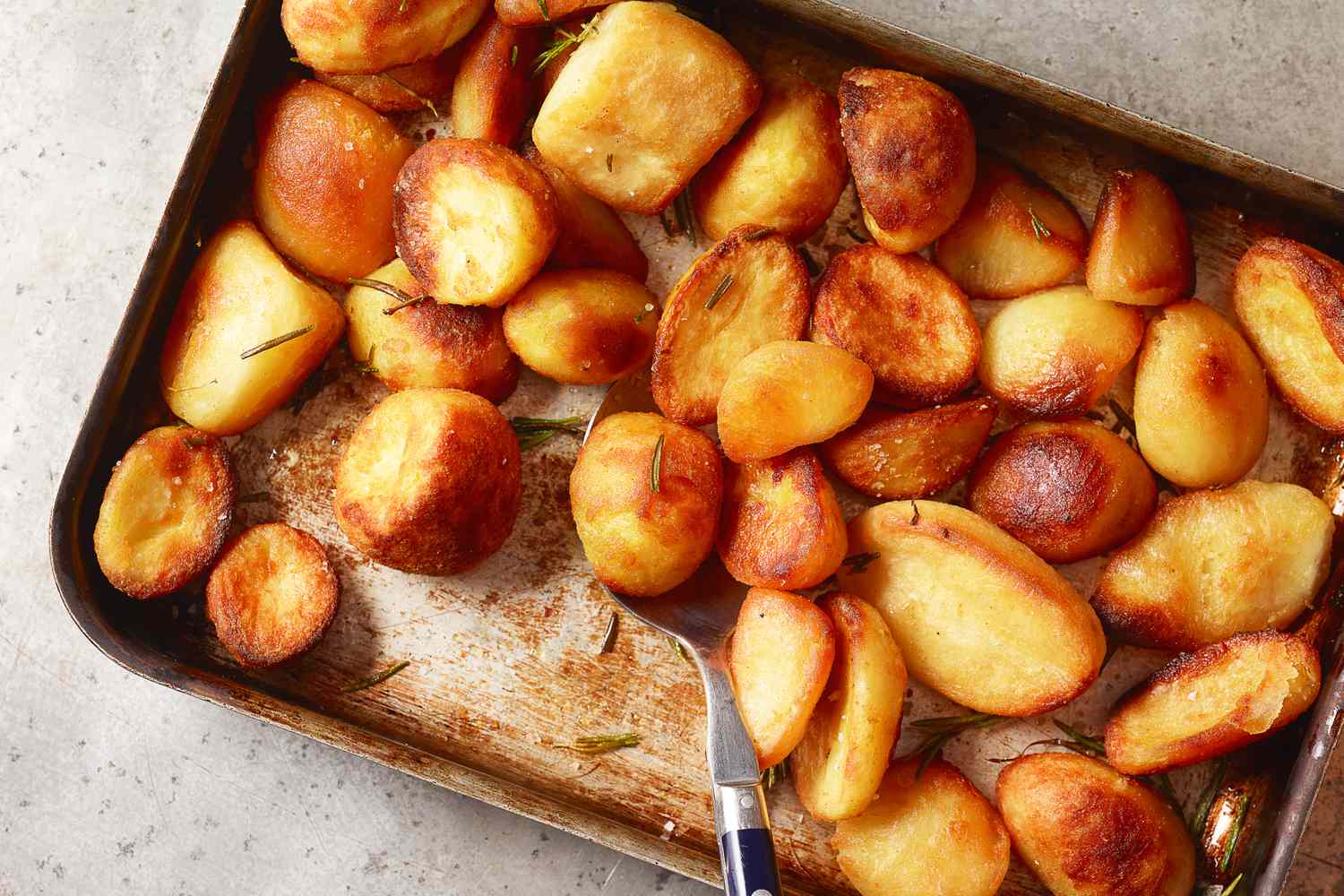 A sheet pan with roasted potatoes