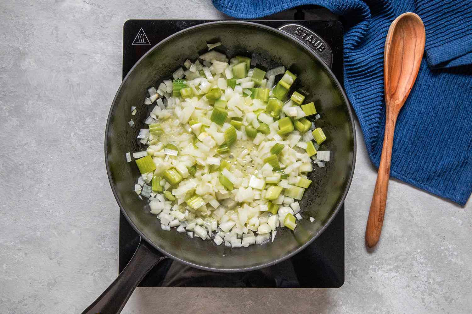 Aromatics sauteed in a cast iron skillet for chicken a la king recipe