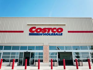 The exterior of a Costco Wholesale store with an entrance visible