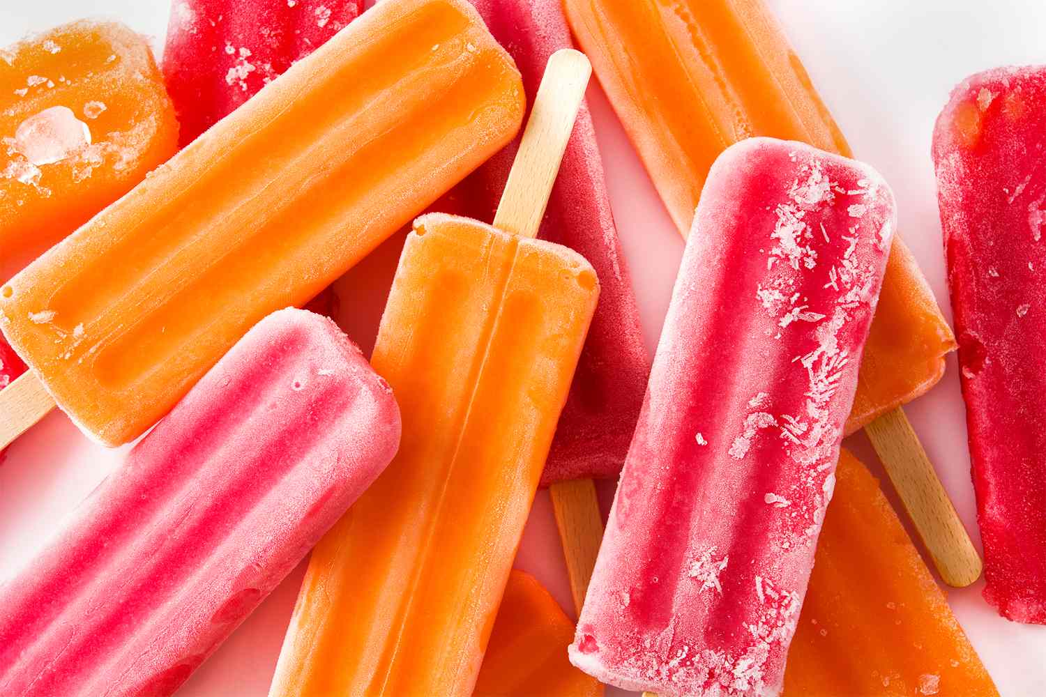 Several popsicles arranged on a surface