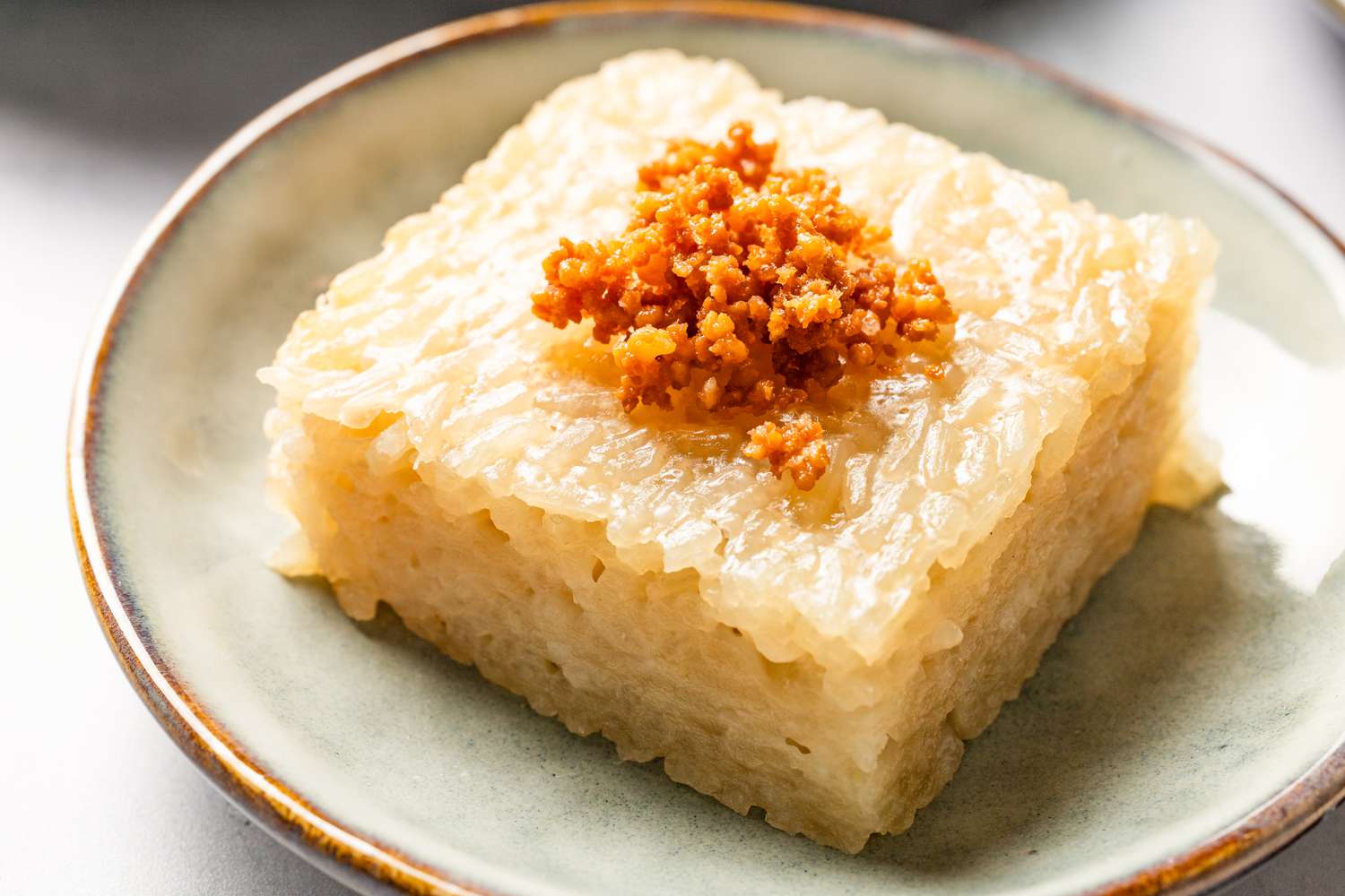 slice of biko (Filipino sticky rice cake) on a plate
