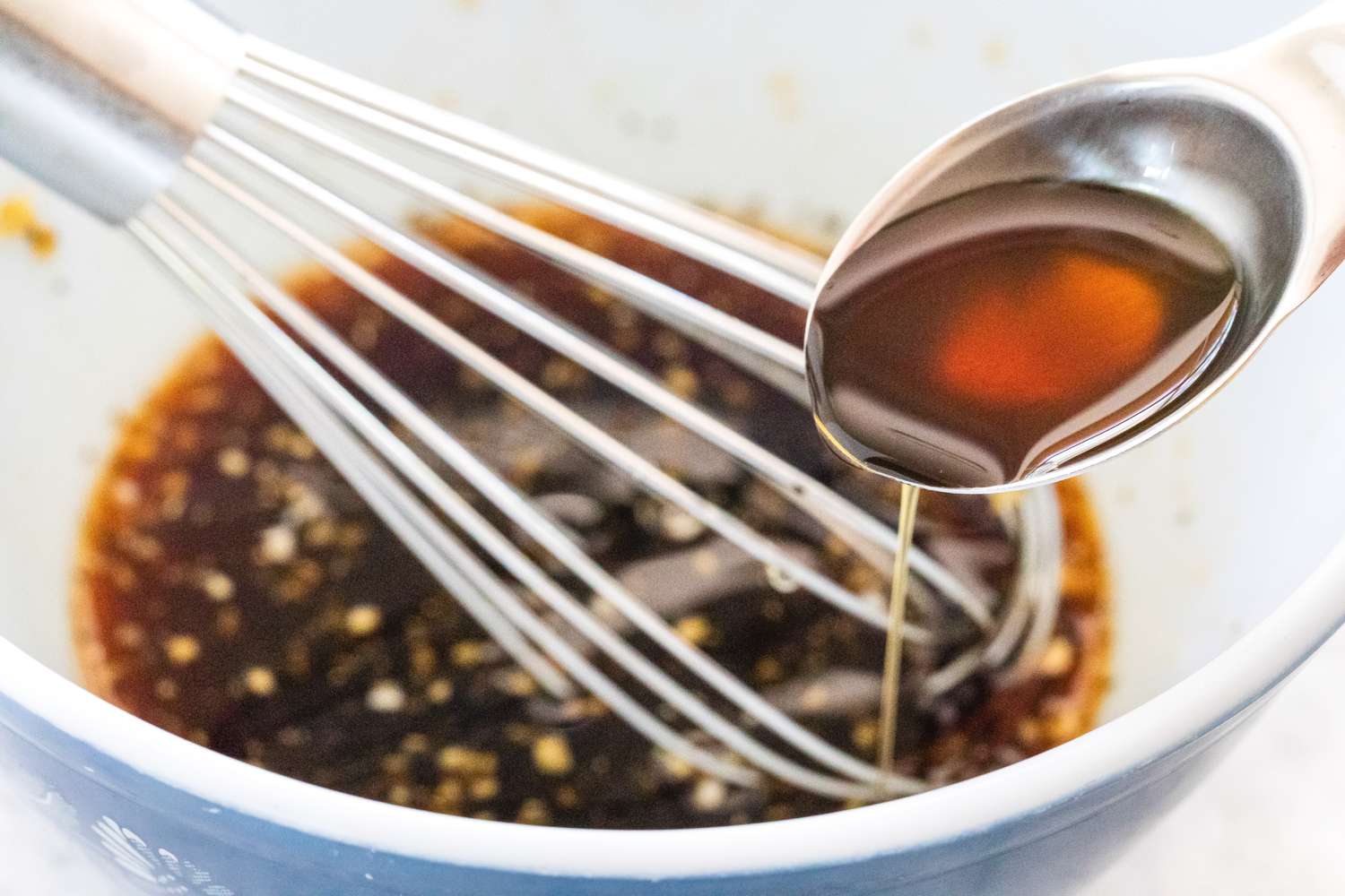 Whisk in sesame oil.