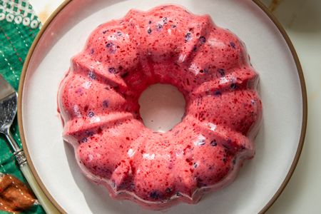 A blueberry gelatin mold dessert served on a plate