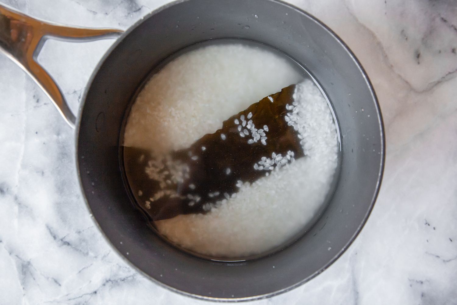 Short-Grain Rice and Kombu in a Pot for Sushi Rice