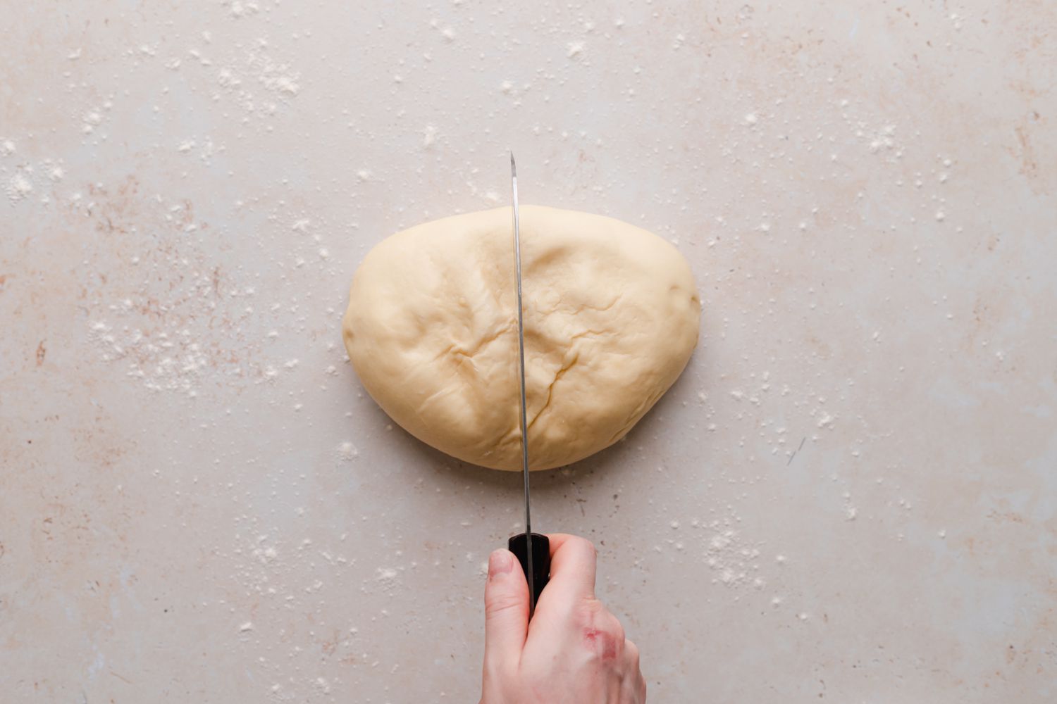 Dough for chocolate loaf bread cut in half.