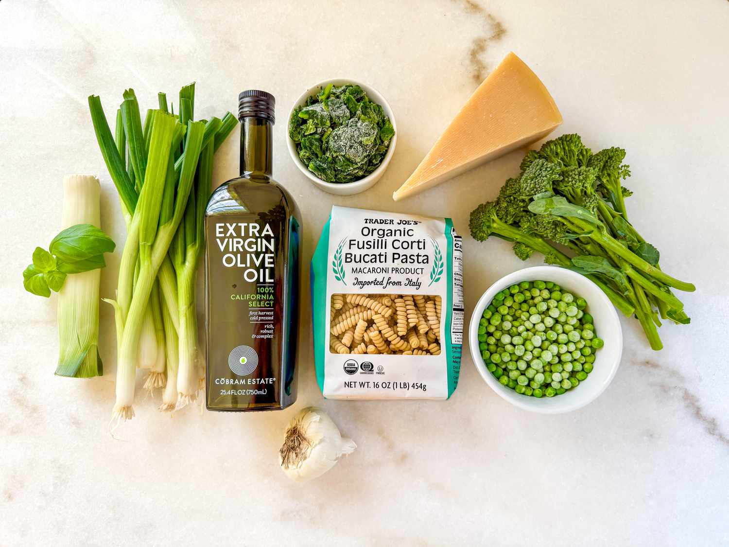 Overhead shot of the ingredients needed for Jamie Oliver's green pasta recipe