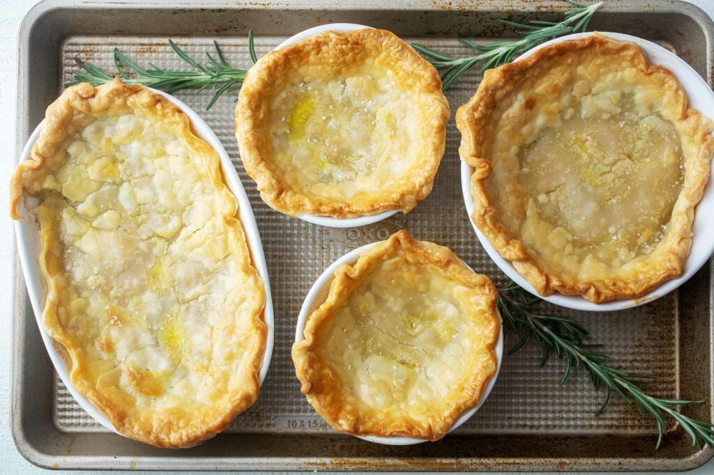 Four leftover turkey pot pies with flaky crust