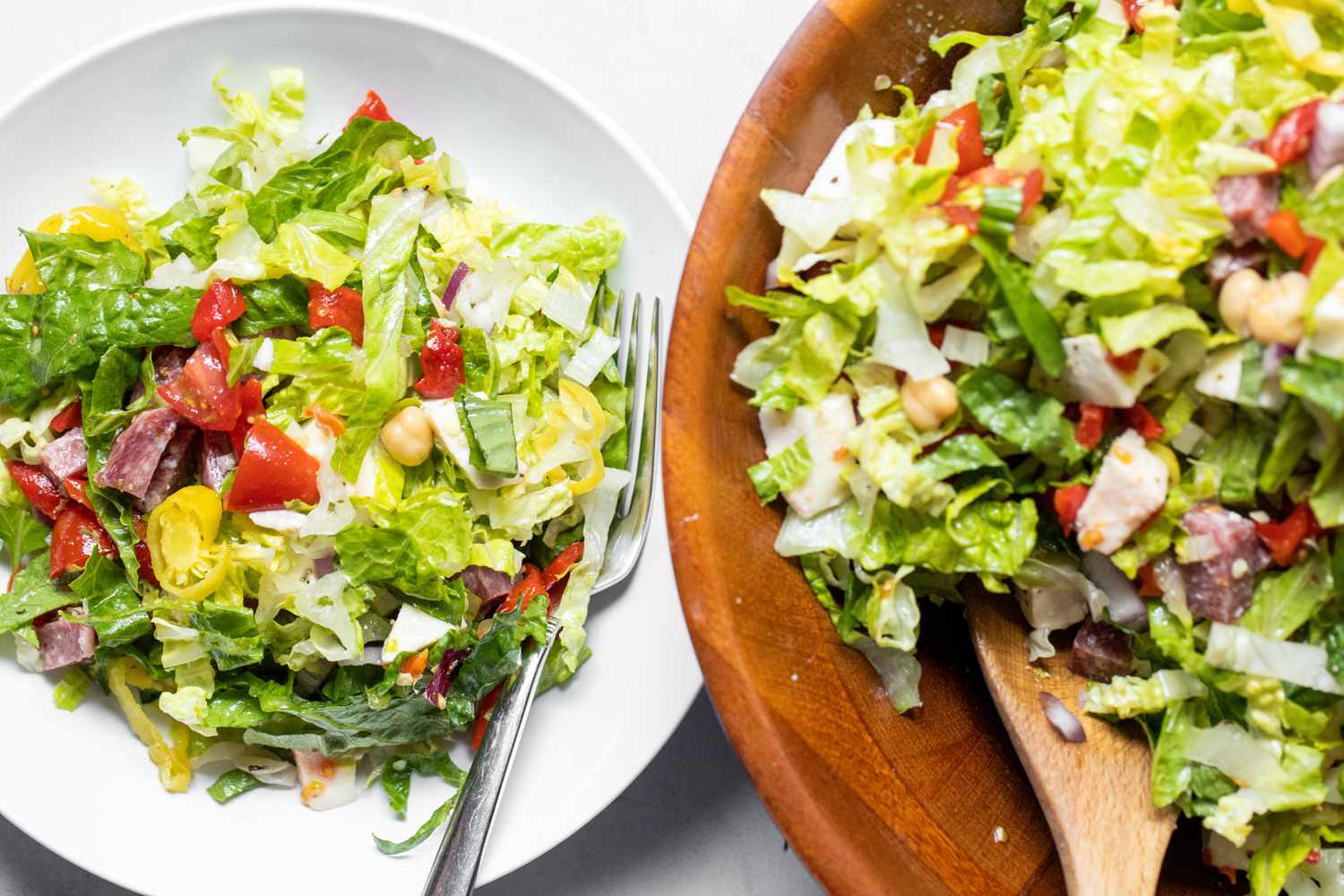 Plate of Italian Chopped Salad Next to a Bowl with More
