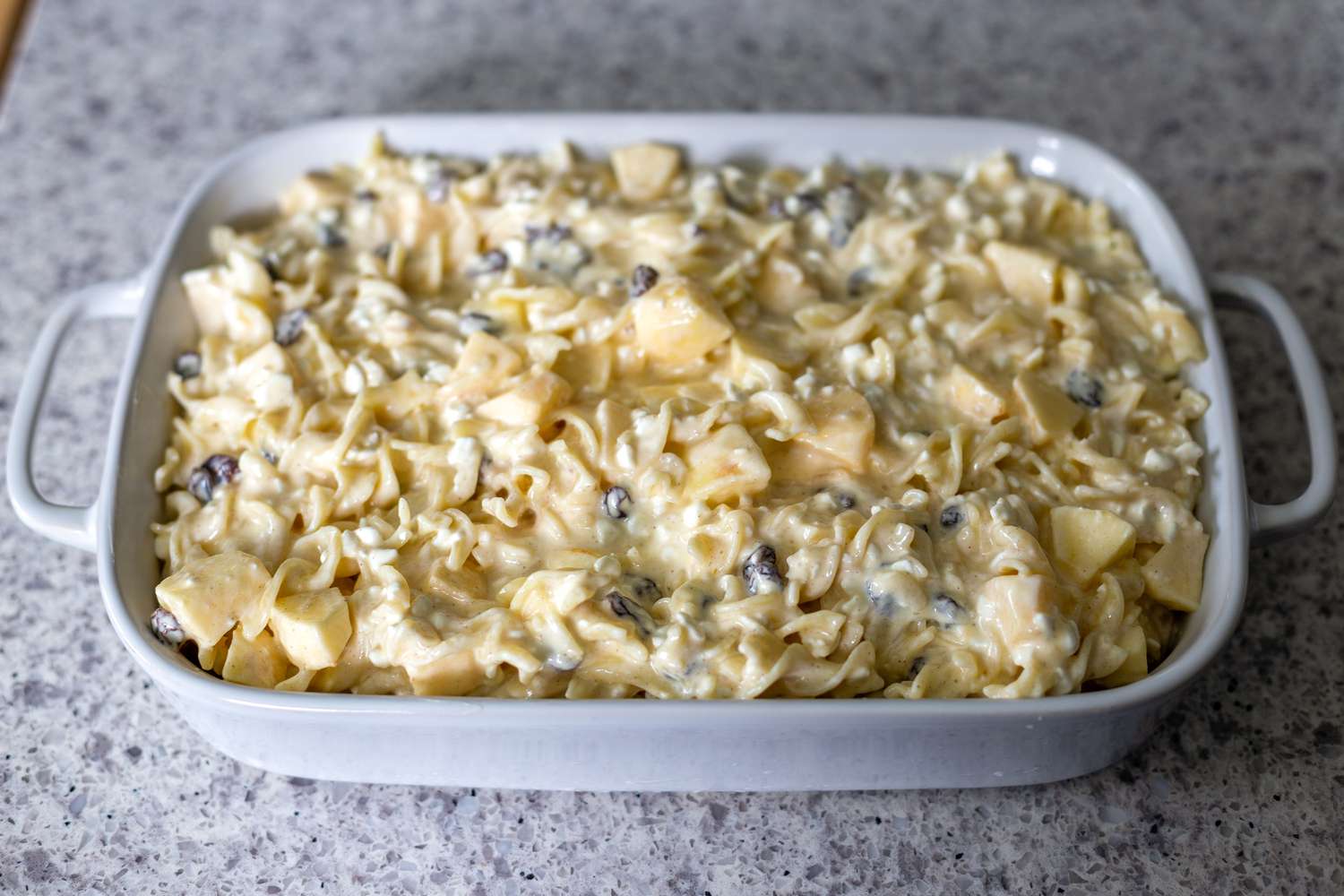 Assemble noodle kugel in casserole dish