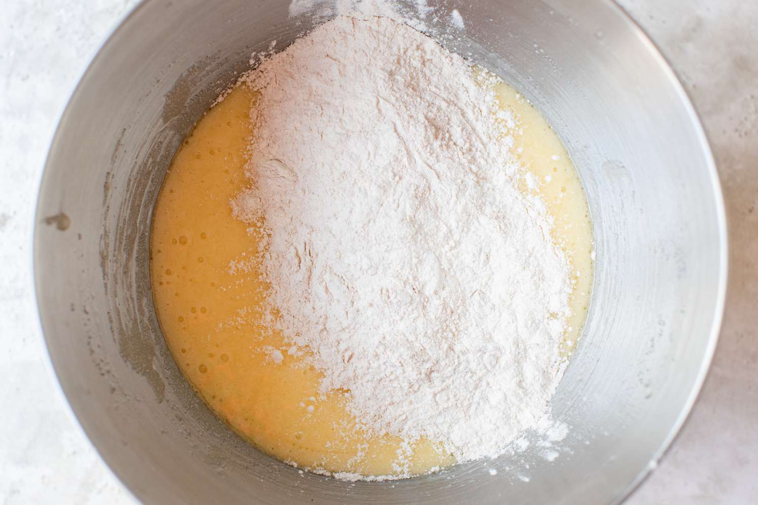 Dry Ingredients Added to Wet Ingredients in Apple Bundt Cake Recipe