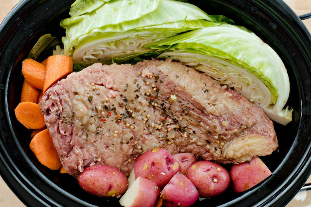 Crockpot Corned Beef - beef cabbage potatoes carrots in crockpot