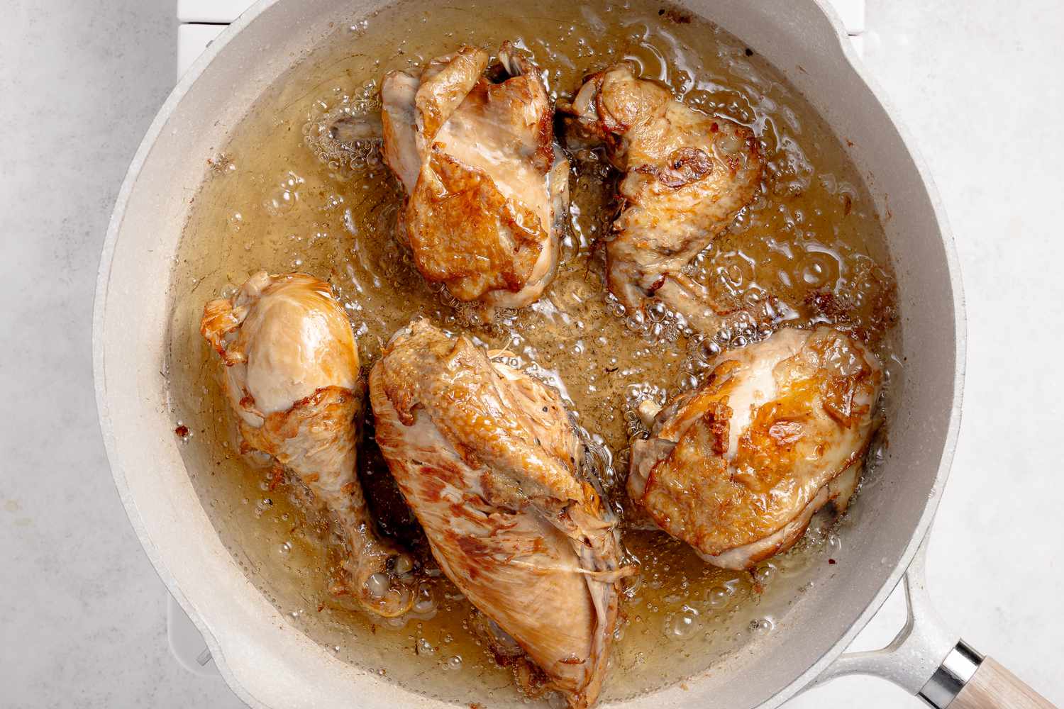 Chicken Pieces Fried in the Same Pot of Hot Oil for Filipino Adobo Recipe