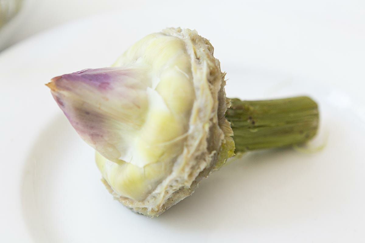 The tender, purple-tipped inner leaves of a cooked artichoke 