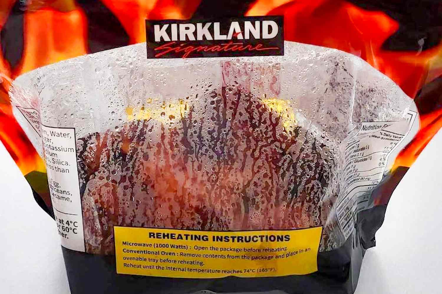 A Costco rotisserie chicken in its new bag packaging