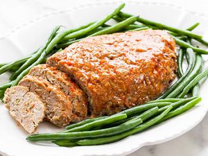 best Turkey Meatloaf cut into slices on a white platter