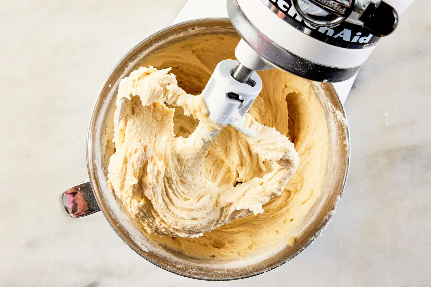 7UP bundt cake batter in a stand mixer for 7UP bundt cake recipe