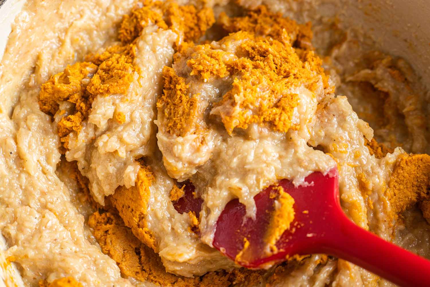 Pumpkin Puree and Thickened Condensed Milk Mixed Together Using a Spatula